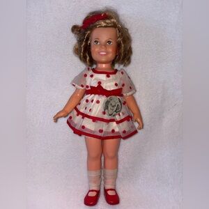 Ideal Shirley Temple 1972
Plastic all original clothes and shoes & 1930’s Button